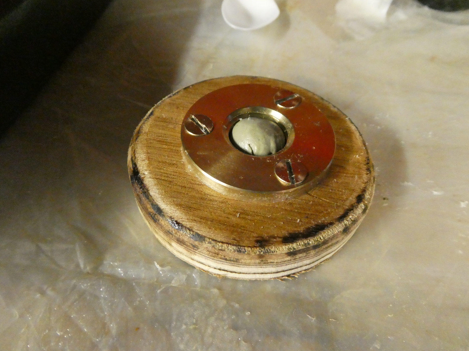 When gluing the plug onto the base, some plumbers putty prevents epoxy from getting in the threads