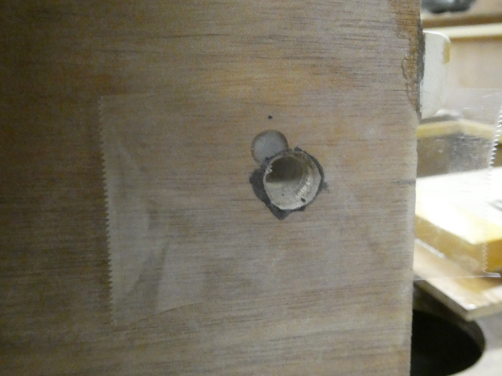 Hole flared ready for the copper tube