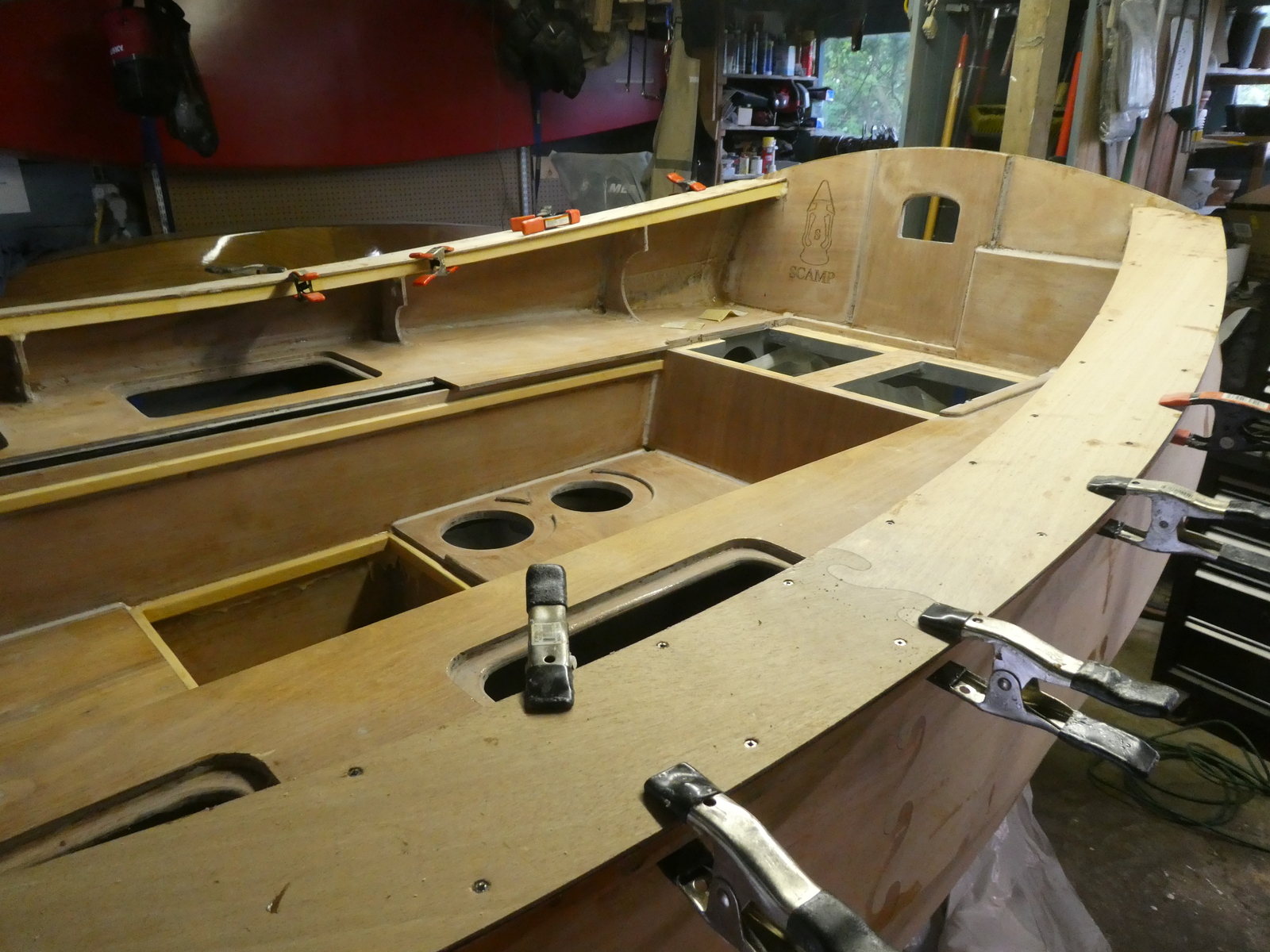 Here you can see the spacing of my screws near the transom, with a few clamps helping out