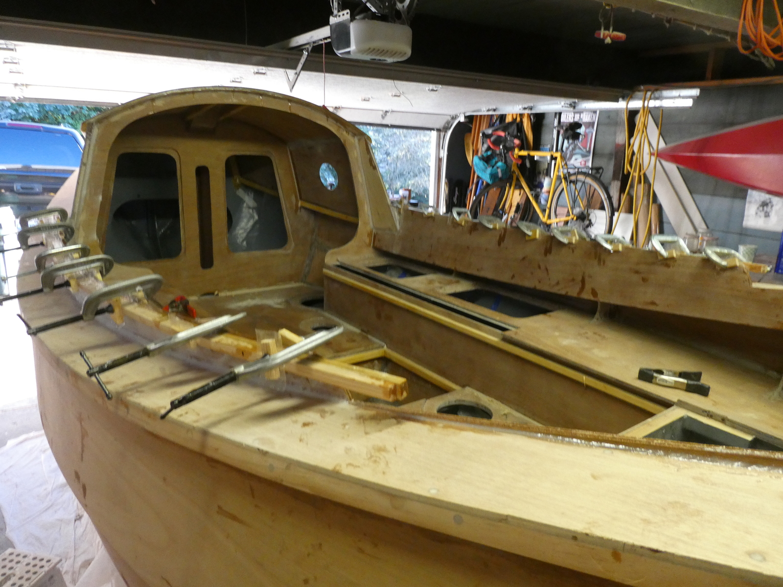 Gluing both port and starboard reinforcement rails on to seat backs at the same time