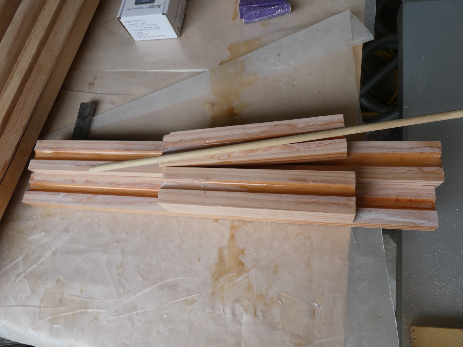 The dowel was used to make sure the routed channel was of a certain size and not blocked by curing epoxy